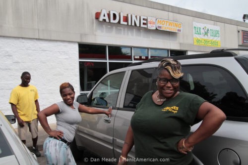 Adline's Hot Wings Express staff outside the store.